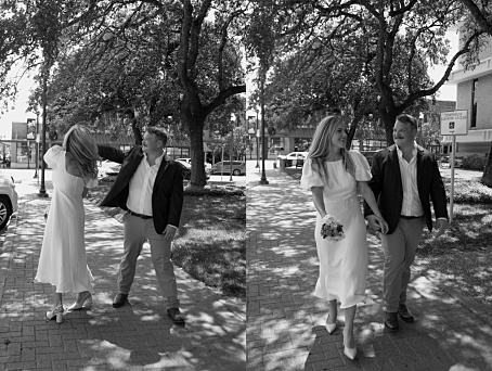 Married couple sharing a joyful walk near the Conroe Courthouse captured by Patricia Perez Photograpghy 