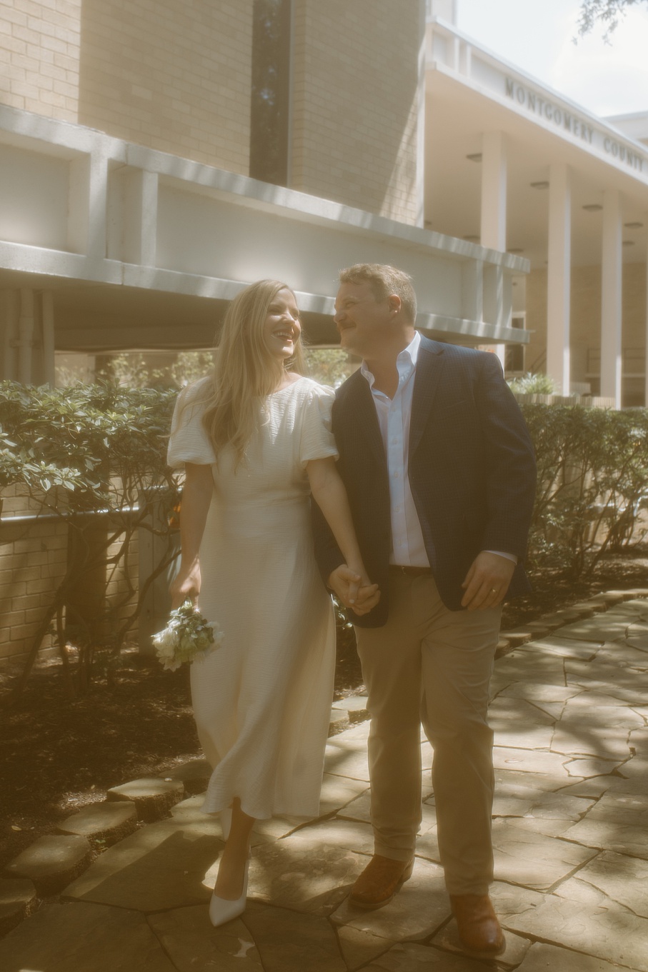 A happy couple, just married, captured outside Montgomery County Courthouse.