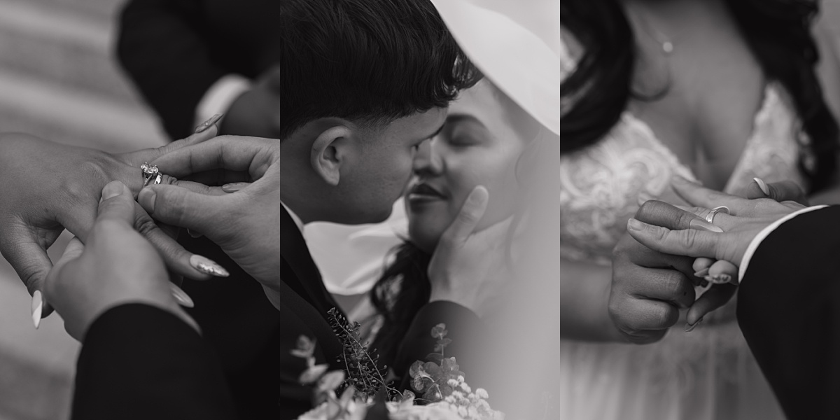 Newlyweds exchange wedding bands and share a kiss outside the 1910 courthouse, captured by Houston elopement photographer.